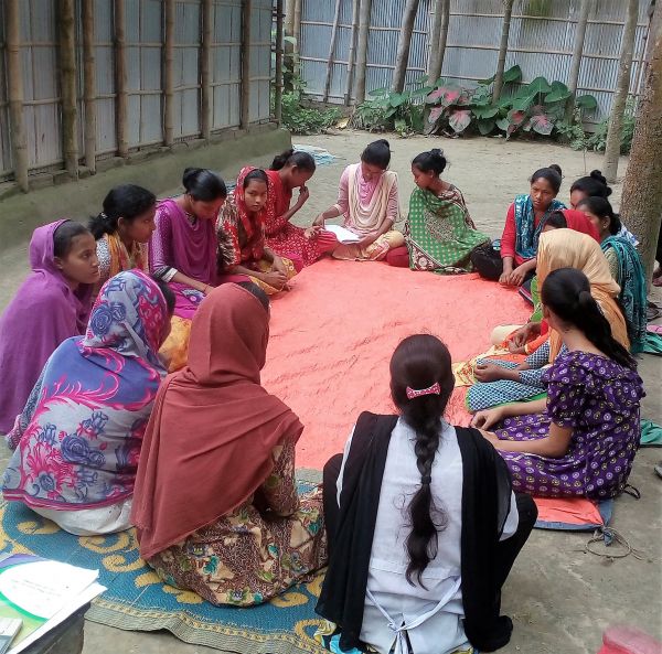 Bangladesh courtyard session: Girls in Bangladesh take part in a peer discussion.
