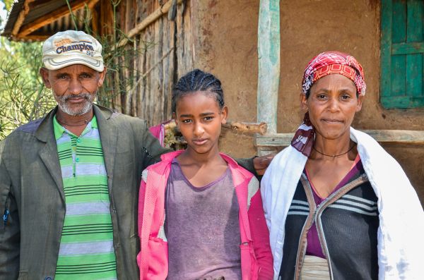 teenage girl with parents in Ethiopia