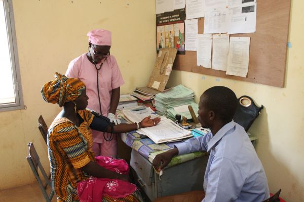 women receiving health check-up in Mali
