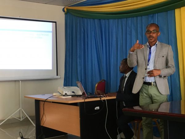 Director of the Kamonyi District Pharmacy providing ICFP 2018 delegates with an overview of Rwanda’s District Pharmacy