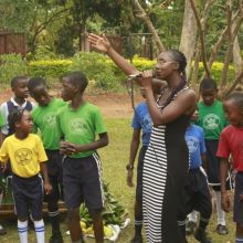 Domanique performing her original song “Investment” with the help of the Nasah Foundation Primary School.