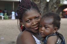 Mother holding her baby.